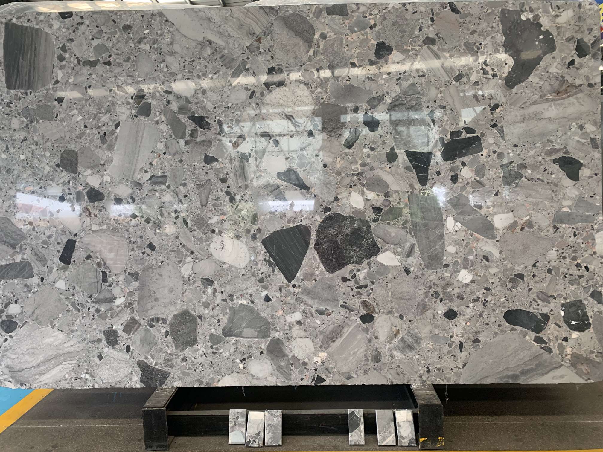 Natural Marble in Terrazzo look available in slabs and blocks
